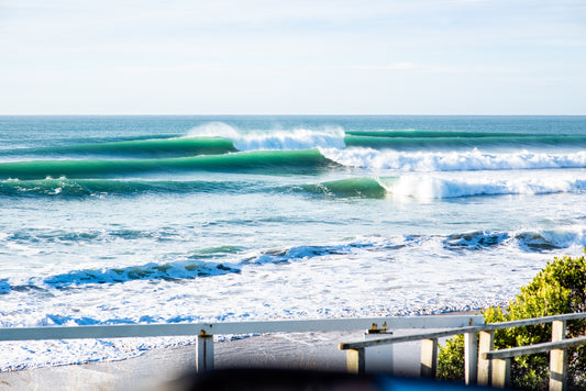 Line up of waves at Wainui Beach in Gisborne New Zealand