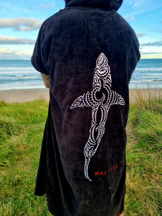 Wai-Tai Kaitiaki Maori hooded towel at Okitu Beach in Gisborne