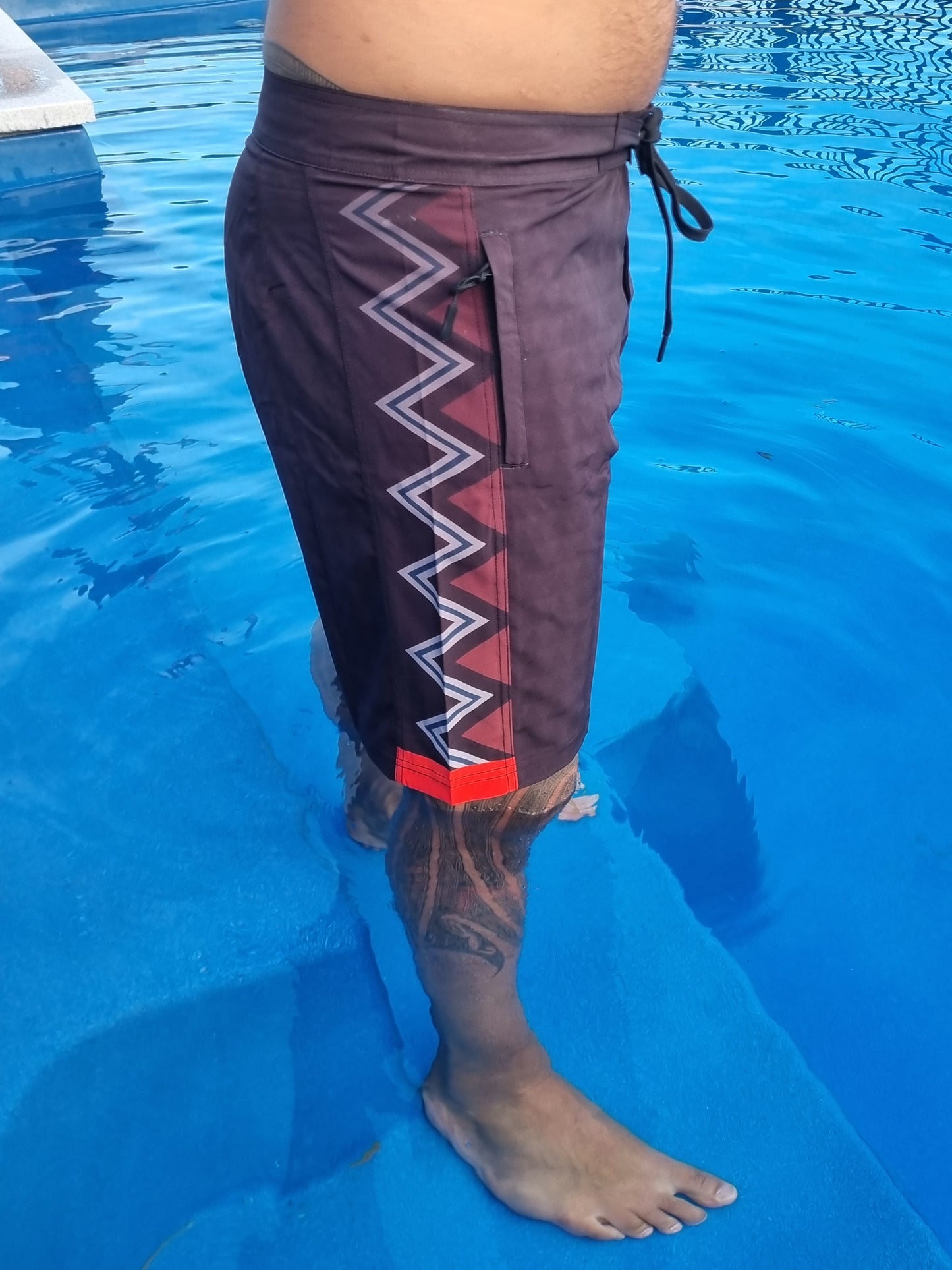 Wai-Tai Aotearoa Taniwha 4 Way Stretch Maori Boardshorts from side