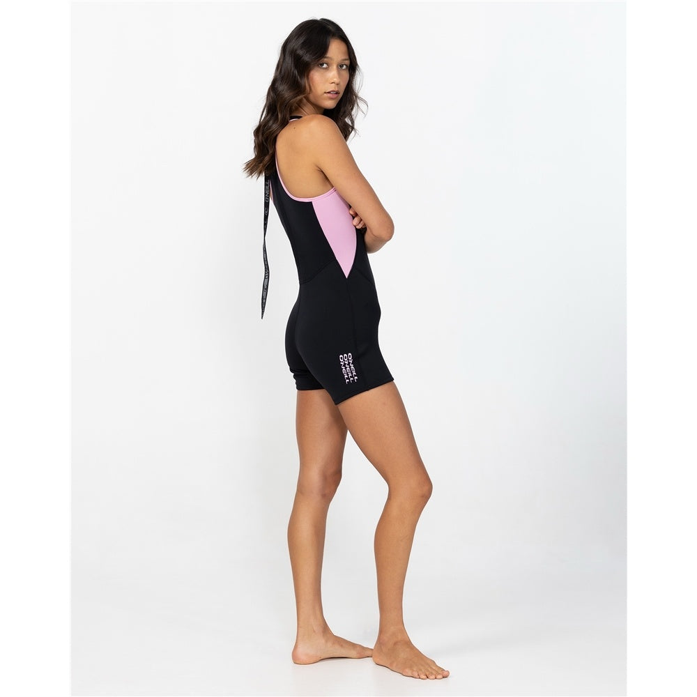 O'Neill Superfreak 2mm Short Jane Women's Wetsuit in black with pink on model from the side