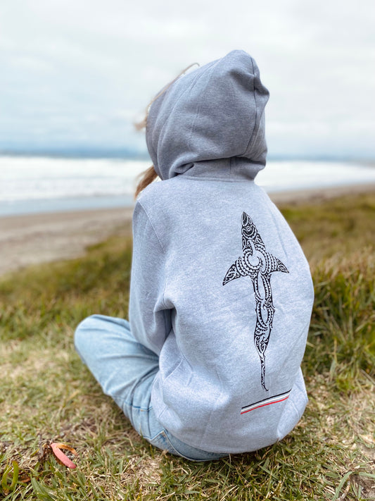 Wai-Tai Kaitiaki Maori Shark Hoodie in grey marle from rear at Midway Beach Gisborne