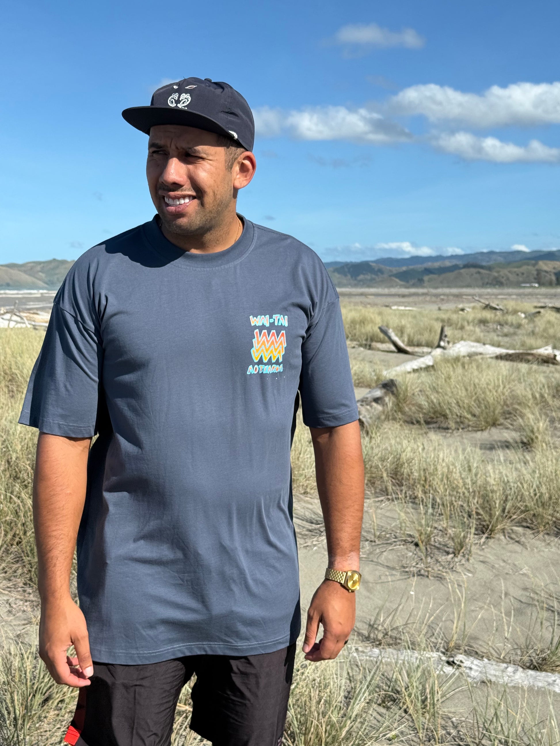 Wai-Tai Mura Heavyweight Tee - Whitinga o te Ra in petrol blue from front