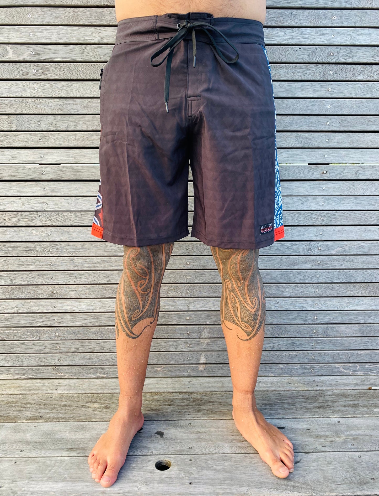 Wai-Tai Aotearoa Taniwha 4 Way Stretch Maori Boardshorts from front