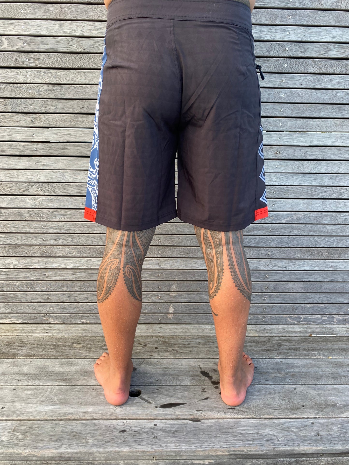 Wai-Tai Aotearoa Taniwha 4 Way Stretch Maori Boardshorts from rear showing taniko sublimated design