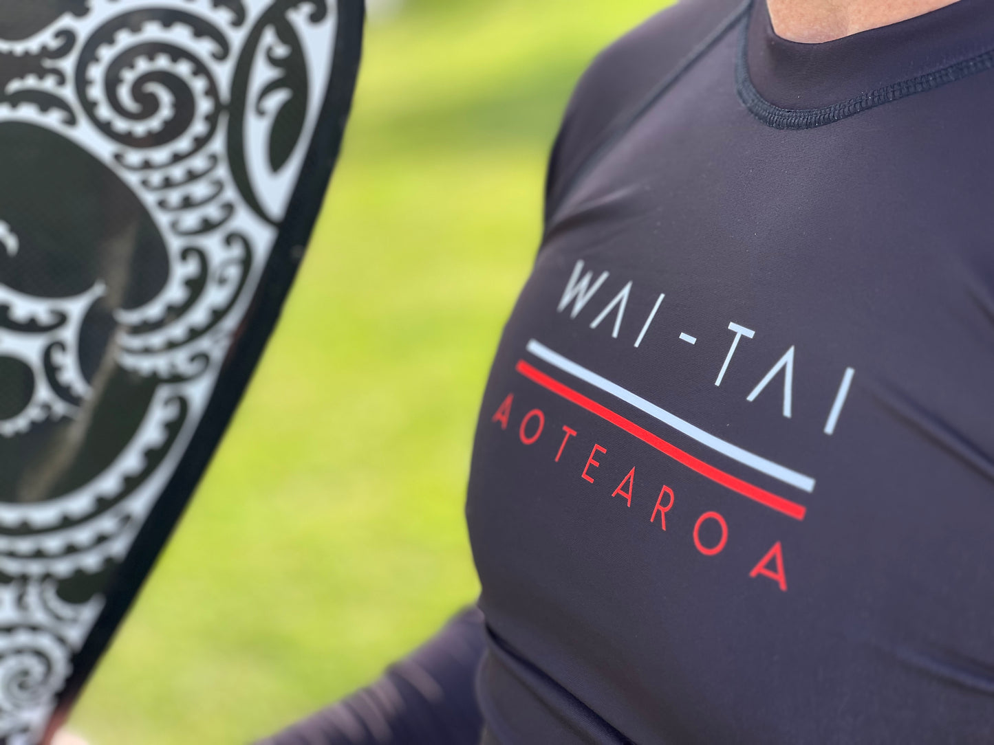 Wai-Tai Aotearoa Patiki Thermal Longsleeve Rash Top close up of front in black