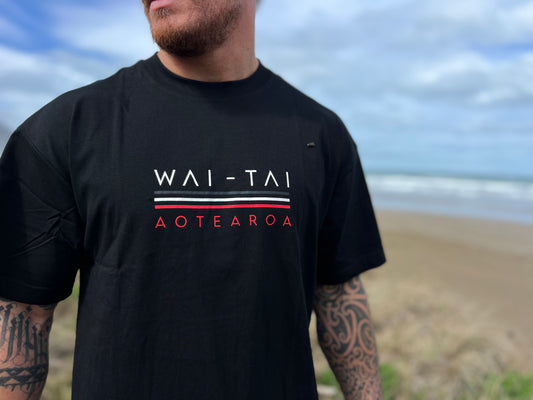 Waitai Tipua Heavyweight Blackout Tee showing front tohu design