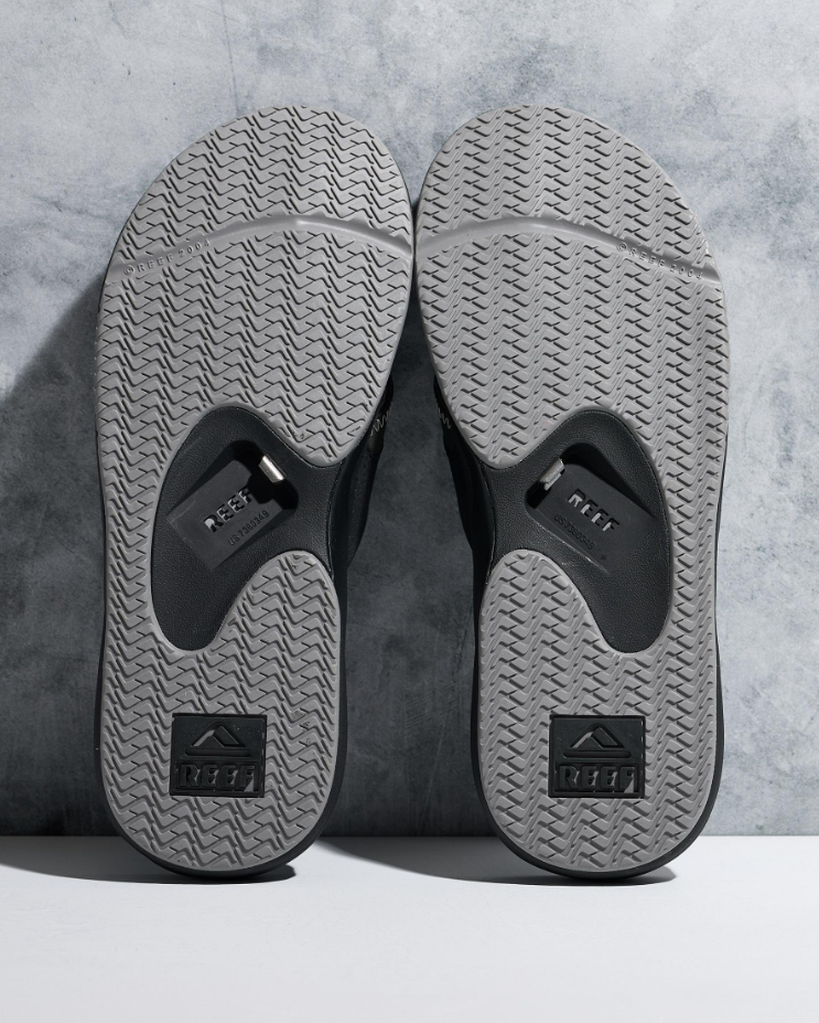 Reef Cushion Fanning Jandals
in black with grey trim showing a pair from below