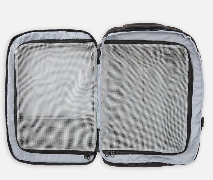 Rip Curl F-Light Transit 45 Litre Wheelie Cabin Bag in midnight colourway showing the bag opened up
