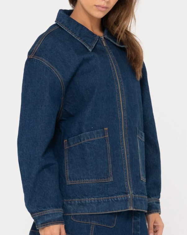 Rusty Ryley Oversized Zip Through Denim Jacket  in deep blue on model from side