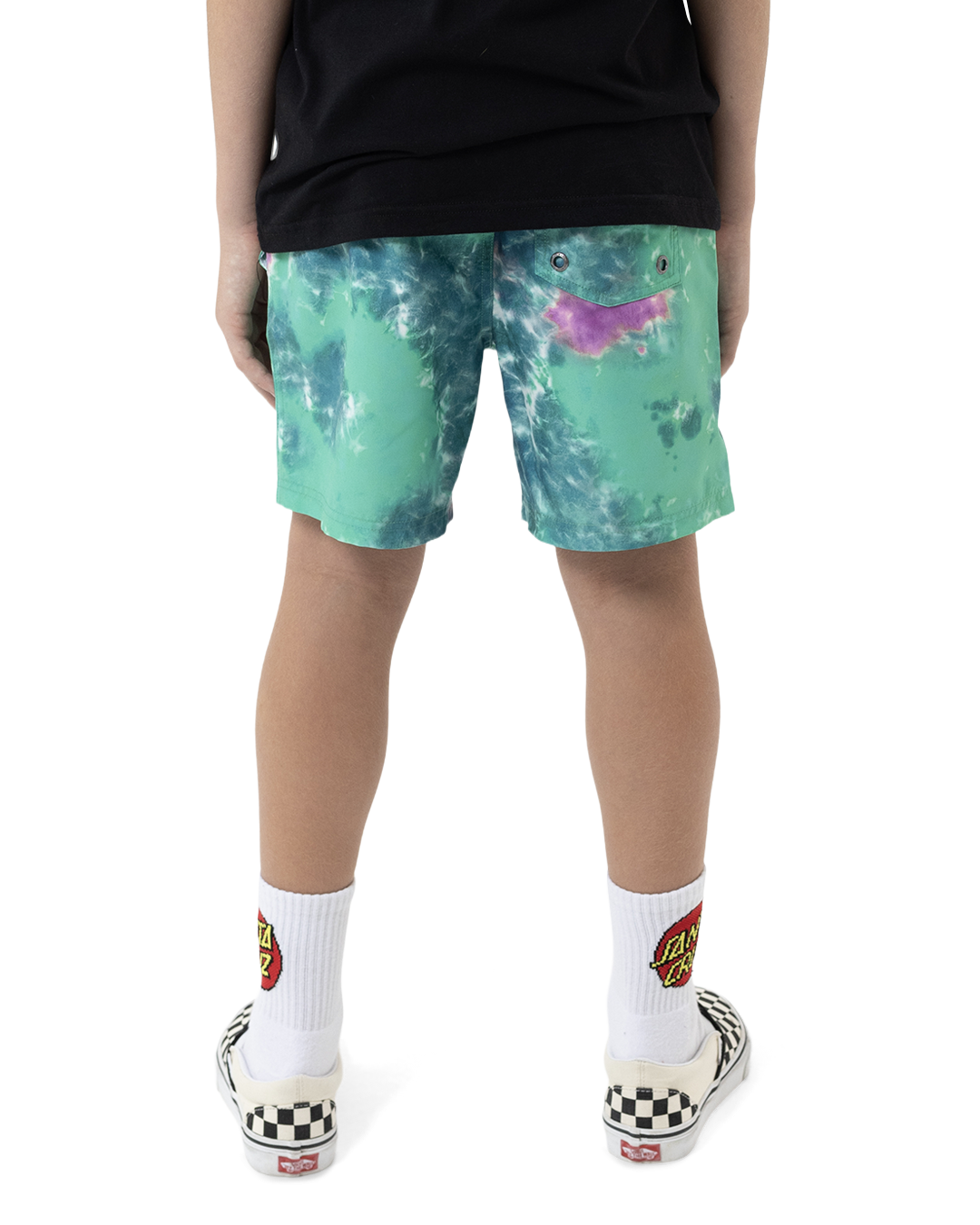 Person wearing tie-dye shorts with a white background