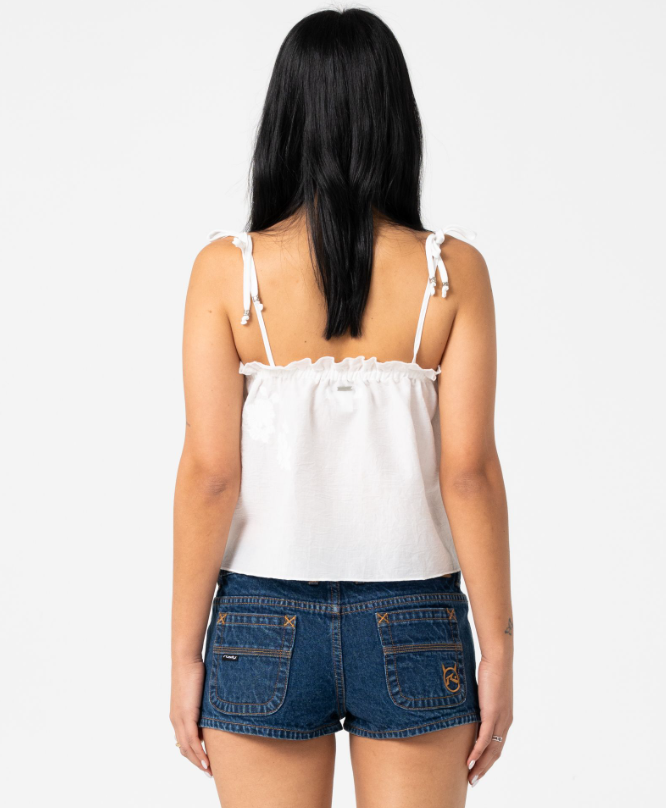 Rusty Feyre Cami Top in white on dark-haired woman from rear