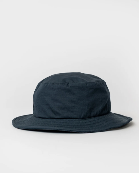 Rusty Carbon Bucket Hat in navy from the rear