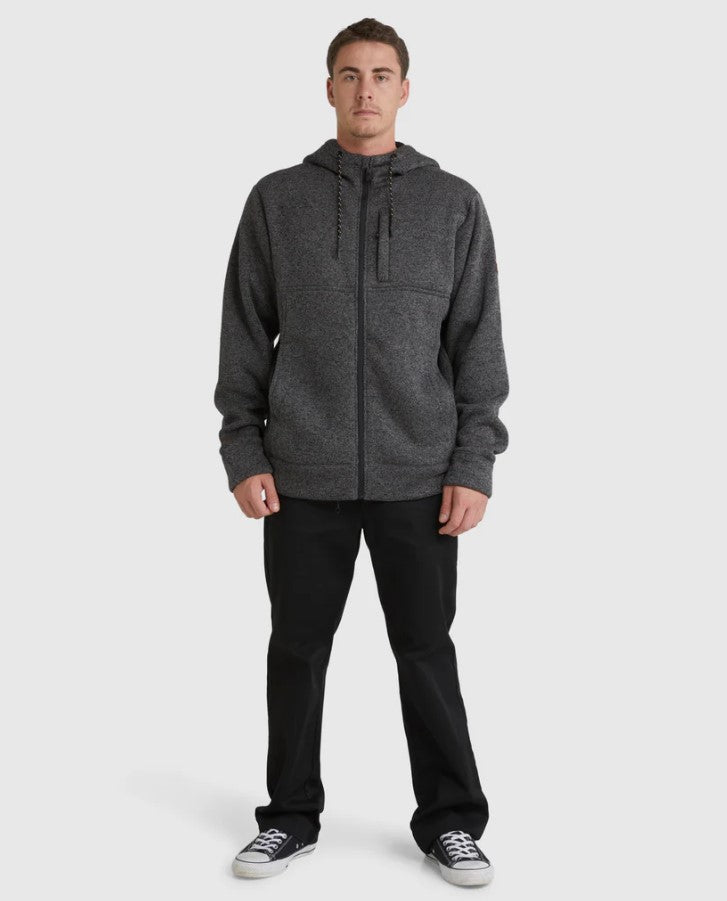 Billabong Boundary Sherpa Zip Hoodie in black heather colourway on man in black trousers