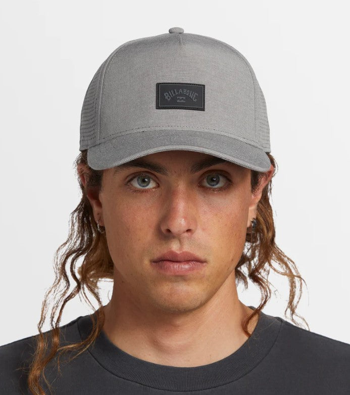 Billabong Crossfire Snapback Cap in grey on model's head