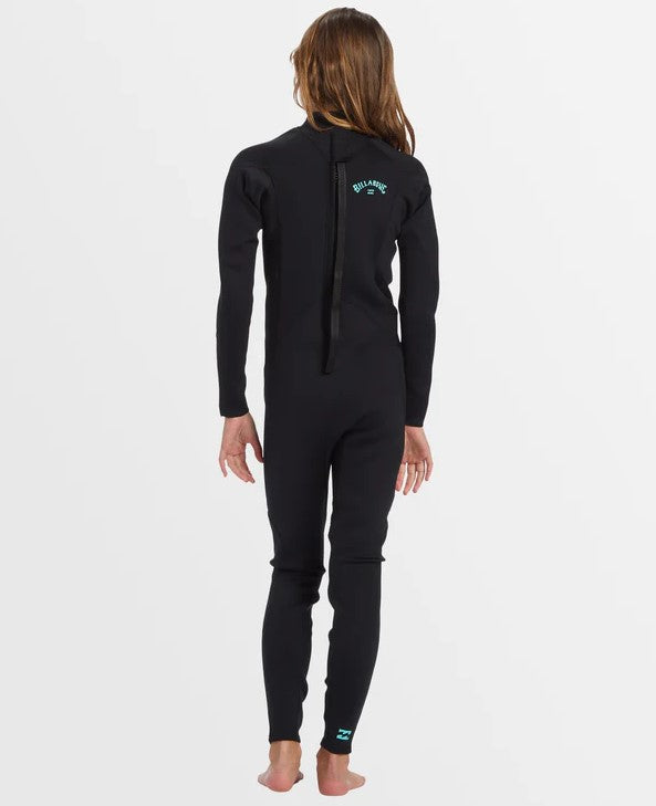 Billabong Foil 3/2mm Girls Flatlocked Back zip Wetsuit in black with teal branding on model from rear
