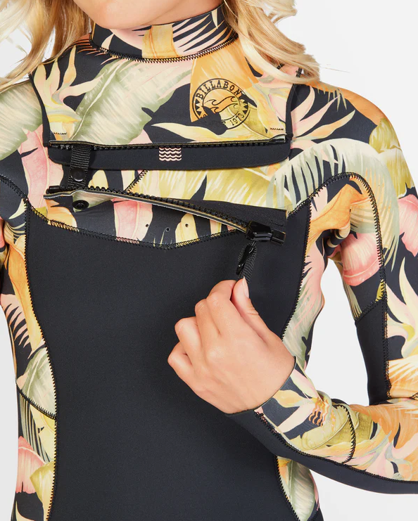 Billabong Teen Salty Dayz 3/2mm CZ GBS Girl's Wetsuit in black wirth jungle night yardage print on arms and side on model from front up close showing the chest zip