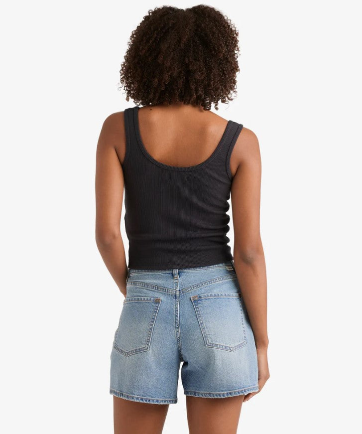 Billabong Shifter 5" Womens Denim Shorts in shaded wash blue on model from rear