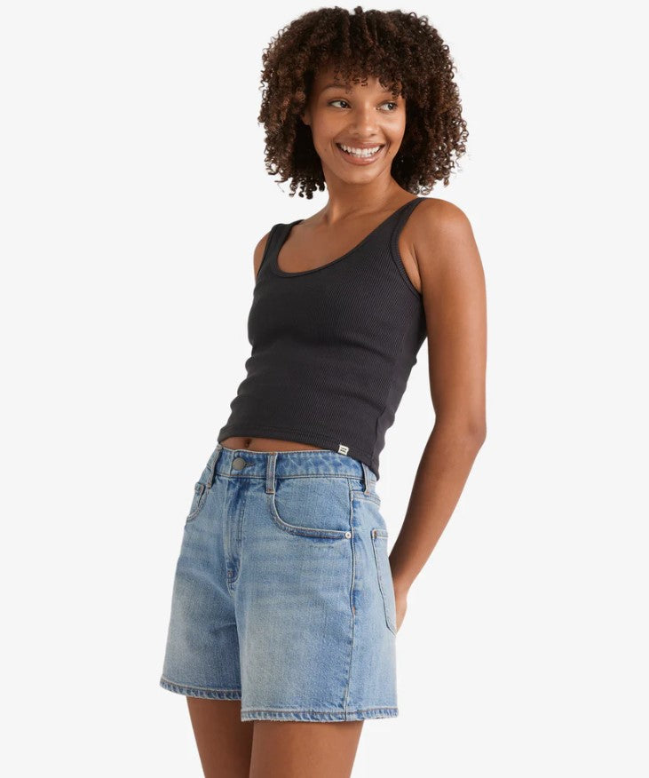 Billabong Shifter 5" Womens Denim Shorts in shaded wash blue on model from side