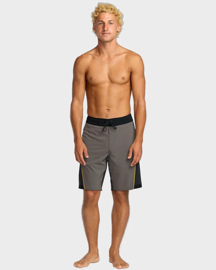 Billabong Straddie Pro 20" Boardshorts on a man with white background in pewter colourway