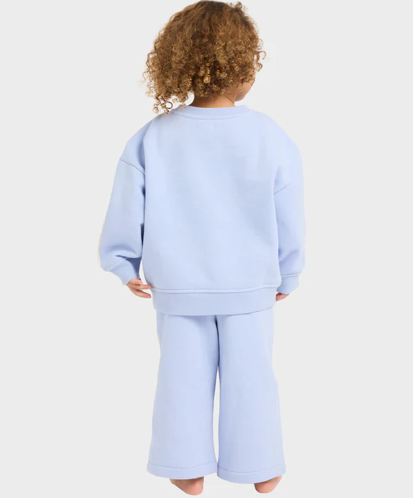 Billabong Welcome To Billabong Girl Toddler's Crew in twilight blue on toddler model wearing twilight blue Billabong trackpants from rear