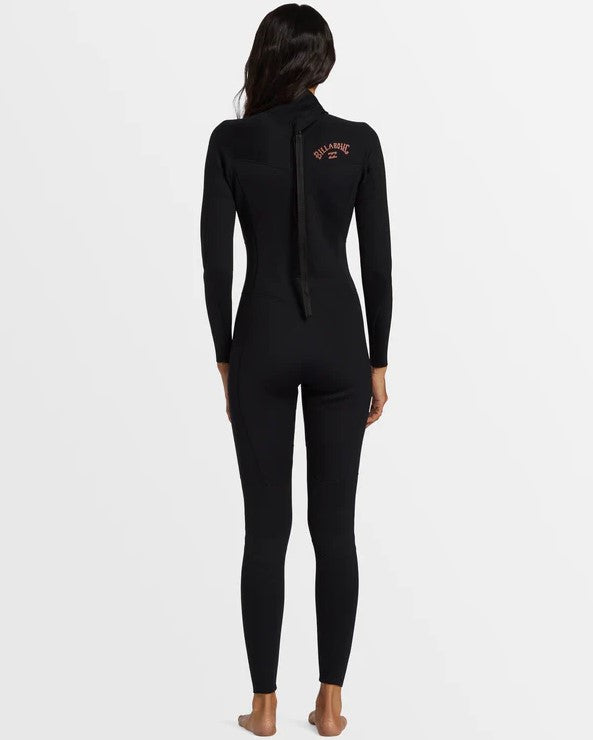 Billabong Womens Foil 3/2mm Back Zip Flatlocked Wetsuit in black on model from rear