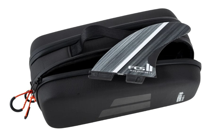 FCS Go-Lite Surfboard Fin Case - 4 Sets in black partially open showing a fin