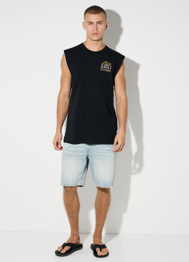 Hurley Supply Co Muscle Top in black on model in light bleu denim shorts from the front
