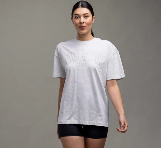 ilabb Varsity Oversized Block Tee in white marle from front on model