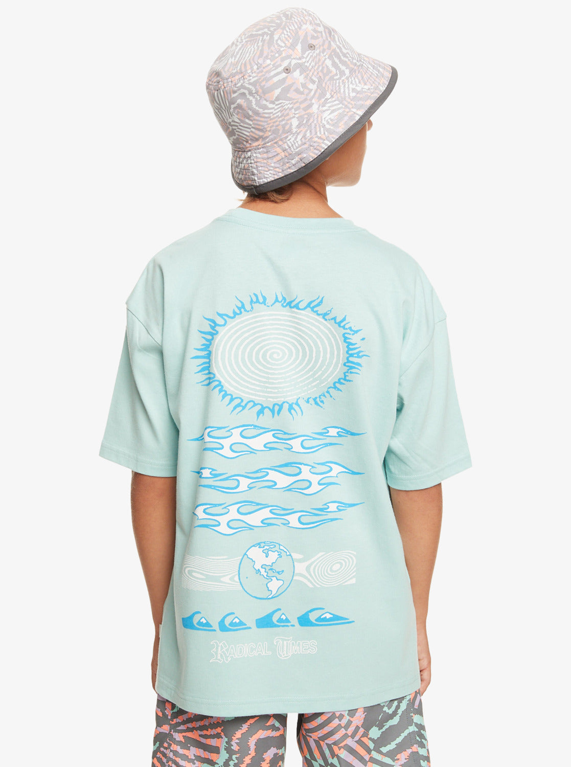 Boy in a bucket hat wearing the Quiksilver Visions Youth Tee in pastel turquoise from back