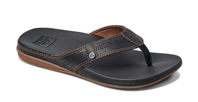 Reef Cushion Lux Jandals in black and brown colourway from side