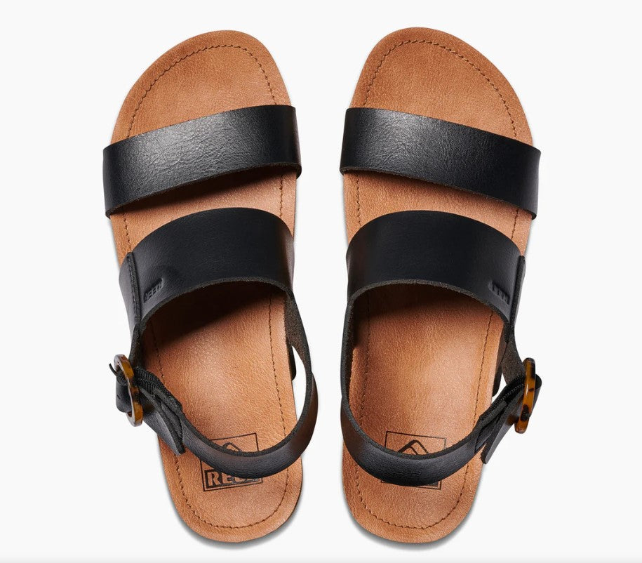 Reef Vista Hi Buckle Sandals pair in black and natural