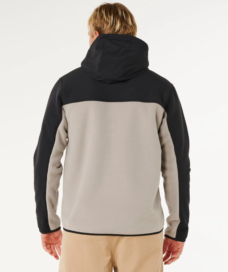 Rip Curl Anti-Series Paneled Z-Thru Hoodie in black and stone colourway on model from rear