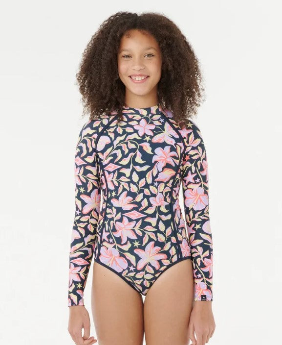 Rip Curl Sunset Skies Girls LS Surfsuit in navy floral colourway on model from front