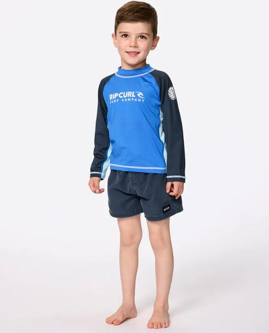 Rip Curl Groms Shock UPF LS Rash Top with a blue gum coloured body and navy arms