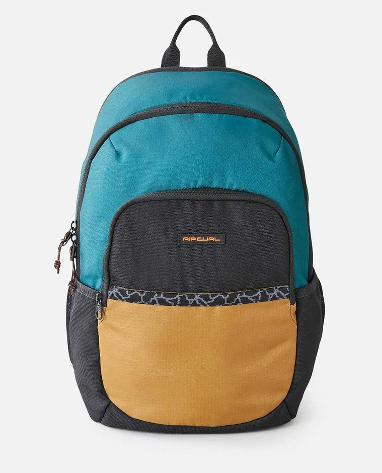 Rip Curl Ozone 33L Journeys Backpack standing alone from front in blue green