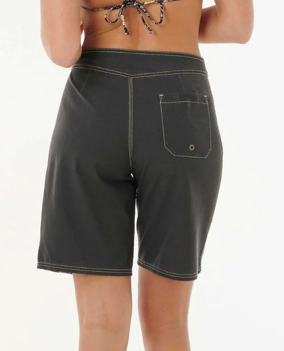 Rip Curl Pacific Rider 10" Womens Boardshorts in black with blue stripes on model from rear