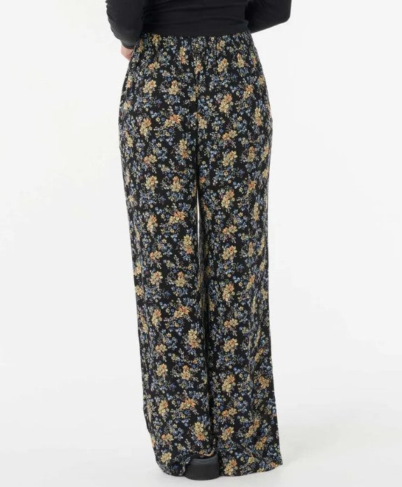 Rip Curl Pacific Rider Ditsy Pants in black floral from rear