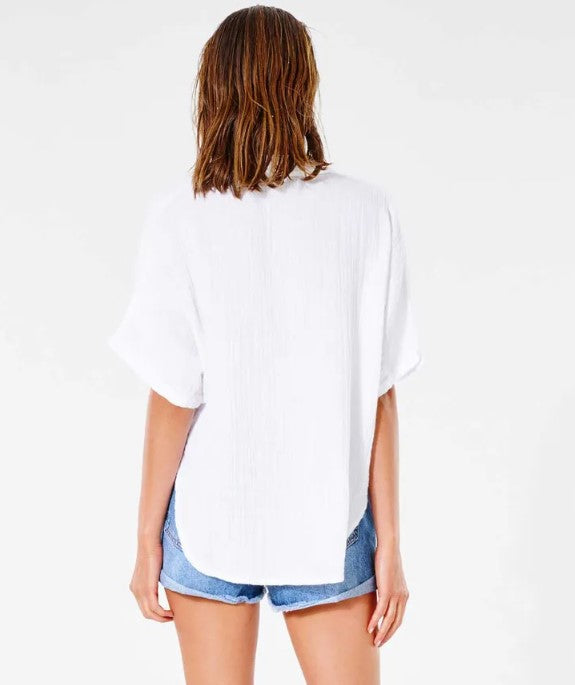 Rip Curl Womens Premium Surf Short Sleeve Shirt in white on model from rear