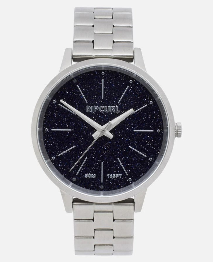 Shop the Rip Curl Lola Slim Stonework Stainless Steel Womens Watch in silver with blue rhinestone face