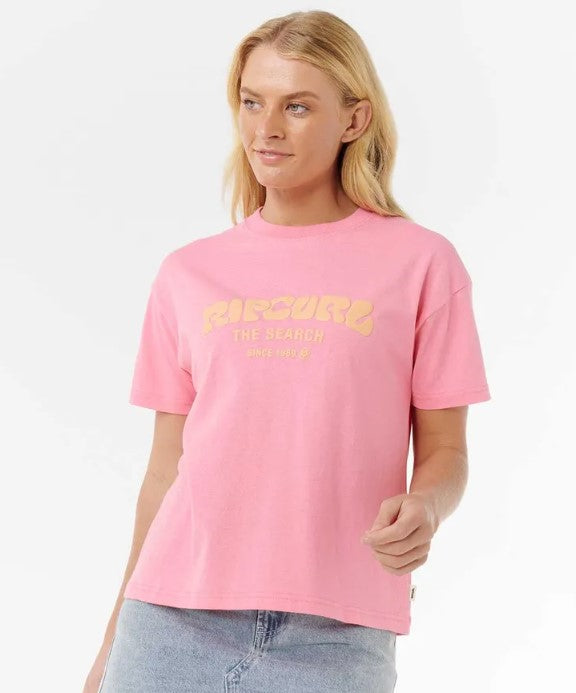 Rip Curl Surf Puff Relaxed Womens T-shirt in pink with orange puff print on the fron worn by a light-haired model
