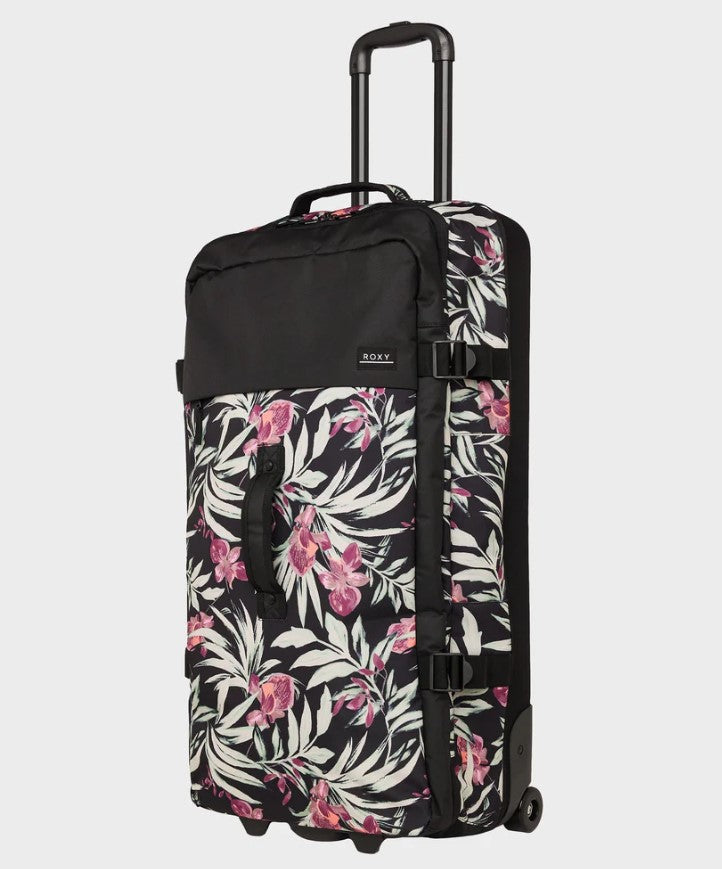 Roxy Big Souvenir 85 Litre Roller Travel Bag Suitcase in antharcite wind swept floral colourway from front/side view