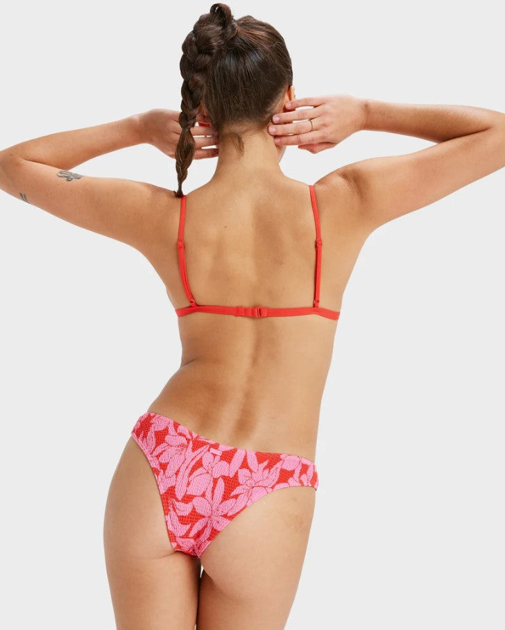 Roxy Khloe Fixed Tri with Cheeky Pant Bikini in tomato klaeido colourway red and pink on model close photo from rear