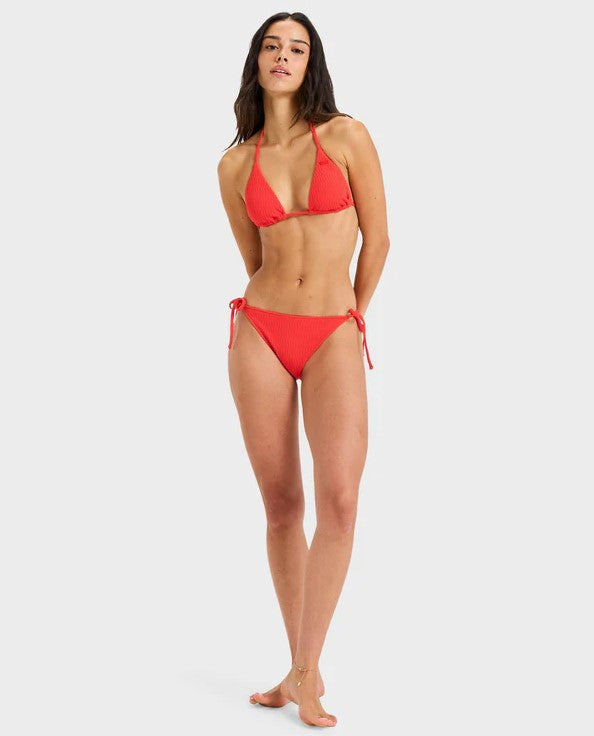 Roxy Lagos Tiki Tri w Tie Side Pant Bikini Set in tomato colourway on dark-haired model from front