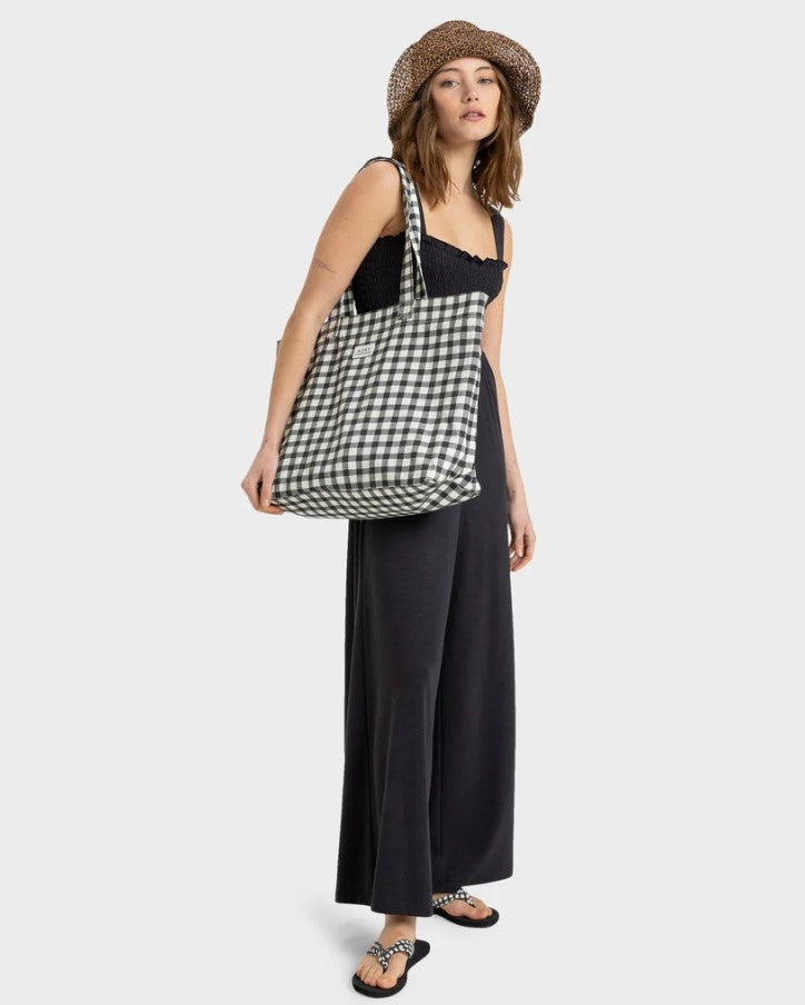 Roxy Sweeter Than Honey Tote Bag in anthracite and white check pattern being hold by woman model