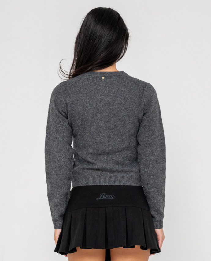 Rusty Academy Women's Cardigan in charcoal marle on model in black skirt from rear