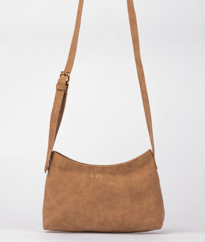 Rusty Aria Suede Side Bag in an by itself on white background