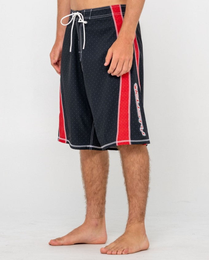 Rusty Cybernate 23" Boardshorts in black with red stripes from side close