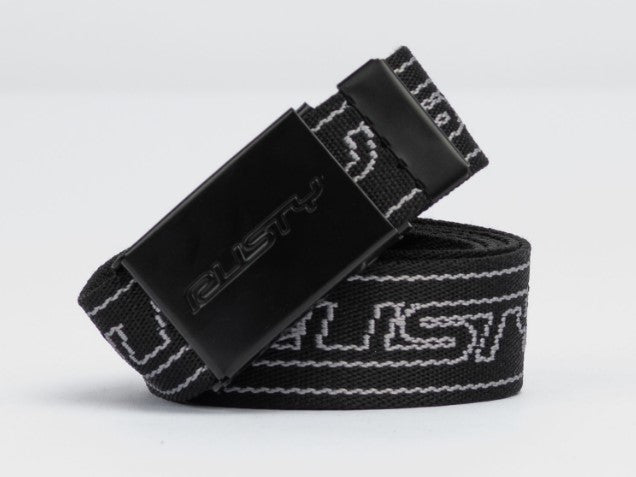 Rusty Flip Daddy Reversible Webbing Belt in black with white detailing in a roll