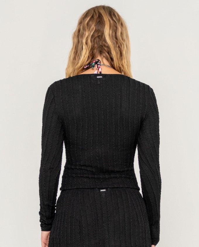 Rusty I Kissed a Pearl Lace Wrap Longsleeve Top in black from rear on blonde model