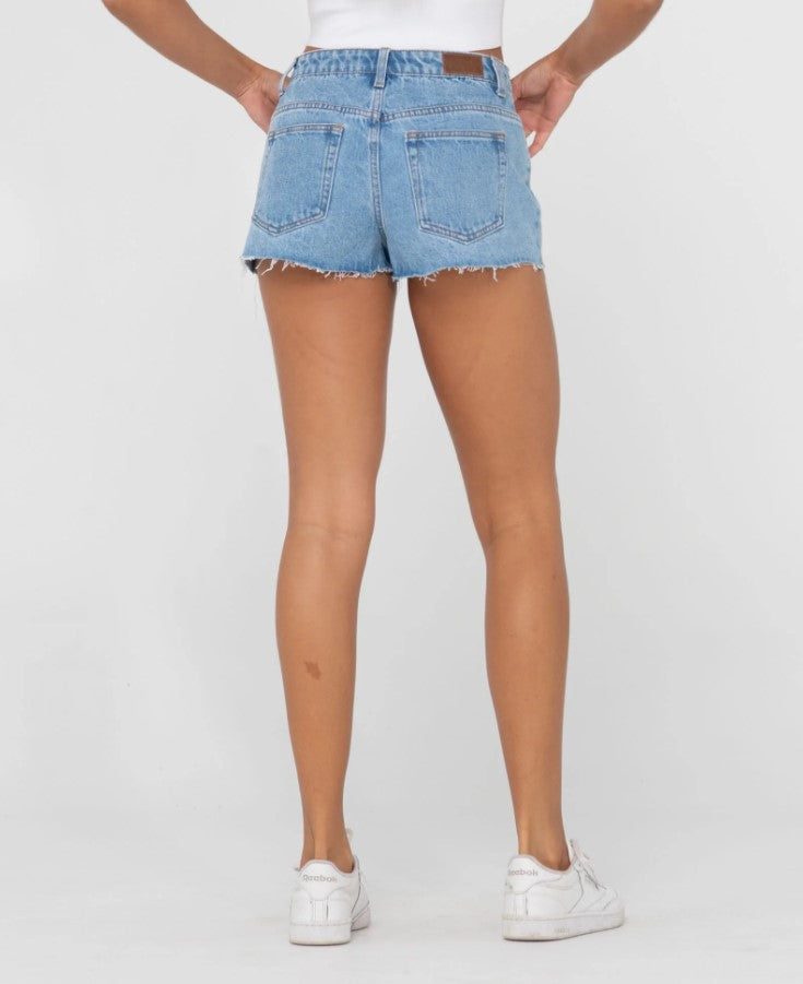 Rusty Malta Low Rise Denim Shorts in blue lagoon from back